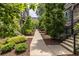 Well-maintained walkway with lush greenery, creating a tranquil entrance to the residences at 399 Pratt Se Dr # 910, Atlanta, GA 30315