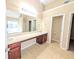 Large primary bathroom with double sinks, long vanity, and neutral color palette at 5622 Platte Dr, Ellenwood, GA 30294