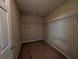 Walk in closet with wire shelving and neutral colored carpet at 5622 Platte Dr, Ellenwood, GA 30294