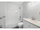 Bathroom featuring a bathtub, tile backsplash, and vanity with under-cabinet storage at 1039 Ridgecrest Se Dr, Smyrna, GA 30080