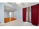 Bedroom featuring gray carpet, access to the porch, light blue paint, and two doors at 1039 Ridgecrest Se Dr, Smyrna, GA 30080