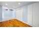 Bedroom showcasing hardwood floors, recessed lighting, and a bright accent wall at 1039 Ridgecrest Se Dr, Smyrna, GA 30080