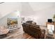 Spacious living room featuring high ceilings and an open-concept design for a modern feel at 104 River Creek Dr, Woodstock, GA 30188