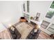 Open living room featuring a fireplace, high ceilings, and plenty of natural light at 104 River Creek Dr, Woodstock, GA 30188