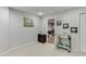 Finished basement space with neutral carpet and decor at 1045 Legacy Walk, Woodstock, GA 30189