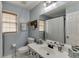 Bathroom featuring bright colors, shower/tub, and modern sink at 1045 Legacy Walk, Woodstock, GA 30189