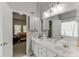 Bright bathroom featuring double sinks, modern fixtures, and natural light at 1045 Legacy Walk, Woodstock, GA 30189