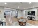 Spacious finished basement with wood flooring, multiple rooms, and neutral walls at 1045 Legacy Walk, Woodstock, GA 30189