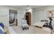 Basement office space with laminate floors, large desk, and chair at 1045 Legacy Walk, Woodstock, GA 30189