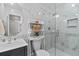 Modern bathroom features marble walls, glass-enclosed shower, and stylish fixtures at 515 Houze Way, Roswell, GA 30076