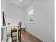 Bright home office space featuring hardwood floors and a window for natural light at 515 Houze Way, Roswell, GA 30076