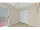This is a small bedroom area with closet and sliding glass doors to an exterior deck at 6359 Wedgeview Dr, Tucker, GA 30084