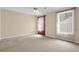 Neutral bedroom with lots of natural light at 6359 Wedgeview Dr, Tucker, GA 30084