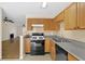 Cozy kitchen with an open view to the living area, connecting cooking and relaxation spaces at 6359 Wedgeview Dr, Tucker, GA 30084