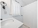 Bathroom featuring a modern sink, toilet, and shower with white tile at 1763 Benningfield Sw Dr, Marietta, GA 30064