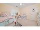 Cozy bedroom featuring a comfortable bed, desk area, and closet at 1763 Benningfield Sw Dr, Marietta, GA 30064
