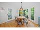 Bright breakfast nook with large windows offering a view of the backyard at 1763 Benningfield Sw Dr, Marietta, GA 30064