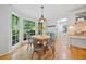 Cozy breakfast nook with large windows and hardwood floors at 1763 Benningfield Sw Dr, Marietta, GA 30064