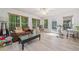 Well-lit living room with hardwood floors and neutral paint at 1763 Benningfield Sw Dr, Marietta, GA 30064