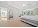 Comfortable bedroom featuring carpet floors, large window, and ample natural light, creating a relaxing retreat at 1763 Benningfield Sw Dr, Marietta, GA 30064