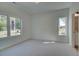 Bright and spacious bedroom with large windows offering natural light and scenic views at 1923 Deco Dr, Kennesaw, GA 30144