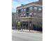 Exterior of a commercial building featuring a social bar on the ground floor at 1923 Deco Dr, Kennesaw, GA 30144