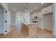 Well-equipped kitchen with stainless appliances, island, and crisp, white cabinetry at 1923 Deco Dr, Kennesaw, GA 30144