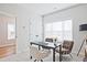 Office with a black desk, two-toned chairs, and large window at 1923 Deco Dr, Kennesaw, GA 30144