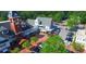 Aerial view of a commercial center with mixed brick and clapboard exterior and manicured landscaping at 3280 Stillhouse Se Ln # 401, Atlanta, GA 30339