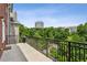 Spacious balcony overlooks treetop views of the city at 3280 Stillhouse Se Ln # 401, Atlanta, GA 30339