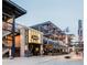 Exterior view of the Yard House restaurant at an entertainment district at 3280 Stillhouse Se Ln # 401, Atlanta, GA 30339