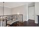 Stylish hallway with a decorative bench and dark wood floors at 3280 Stillhouse Se Ln # 401, Atlanta, GA 30339