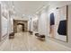 Hallway with stone archway and modern art at 3280 Stillhouse Se Ln # 401, Atlanta, GA 30339