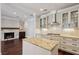 Bright kitchen features stainless steel appliances, stone countertops, and island with storage at 3280 Stillhouse Se Ln # 401, Atlanta, GA 30339