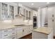 Beautiful kitchen with granite countertops, modern appliances, and custom cabinets at 3280 Stillhouse Se Ln # 401, Atlanta, GA 30339