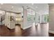 Open floor plan featuring kitchen with island, stainless steel appliances and living area at 3280 Stillhouse Se Ln # 401, Atlanta, GA 30339