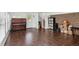 Spacious basement area with tile flooring, offering versatility for various uses at 3425 Poplar Dr, Lawrenceville, GA 30044