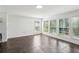 Bright living room featuring tile floors and many windows offering natural light at 3425 Poplar Dr, Lawrenceville, GA 30044