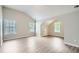 Bedroom featuring wood floors, a vaulted ceiling, and natural light at 7078 Ravenwood Ln, Lithonia, GA 30038