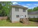 Exterior view of a home with a deck and backyard, showcasing the outdoor living space at 1039 Fern Se Ave, Atlanta, GA 30315