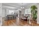 Stylish dining area features bright natural light, an open concept design, and elegant furnishings at 1039 Fern Se Ave, Atlanta, GA 30315