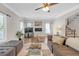 Living room with hardwood floors, neutral paint and a comfortable seating arrangement at 1039 Fern Se Ave, Atlanta, GA 30315