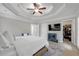 Large main bedroom boasts a ceiling fan, tv, and walk-in closet at 1039 Fern Se Ave, Atlanta, GA 30315