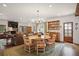 Spacious dining area with a cozy ambiance, seamlessly connected to the living room, perfect for gatherings at 114 Karland Nw Dr, Atlanta, GA 30305