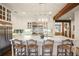 Spacious kitchen features a large island with seating and white cabinets, perfect for entertaining at 114 Karland Nw Dr, Atlanta, GA 30305