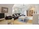 Comfortable living room with a sectional sofa, a white coffee table, and great lighting at 114 Karland Nw Dr, Atlanta, GA 30305