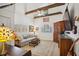 Bright living room with high ceilings, exposed beams, comfortable seating, and charming decor at 114 Karland Nw Dr, Atlanta, GA 30305