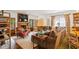 Inviting living room boasts fireplace, tv, hardwood floors, natural light, and comfortable seating at 114 Karland Nw Dr, Atlanta, GA 30305