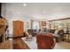 Spacious living room features hardwood floors, fireplace, neutral paint, comfortable seating, and natural light at 114 Karland Nw Dr, Atlanta, GA 30305