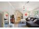 Stylish living room features a sectional sofa, chic decor, and abundant natural light at 114 Karland Nw Dr, Atlanta, GA 30305